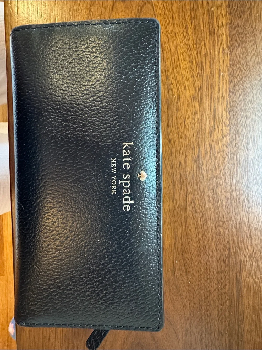 kate spade Black Pebbled Leather Continental Wallet with Gold Logo